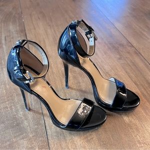 Michael Kors black parent leather heels, size 5.